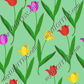 Colorful tulips on green